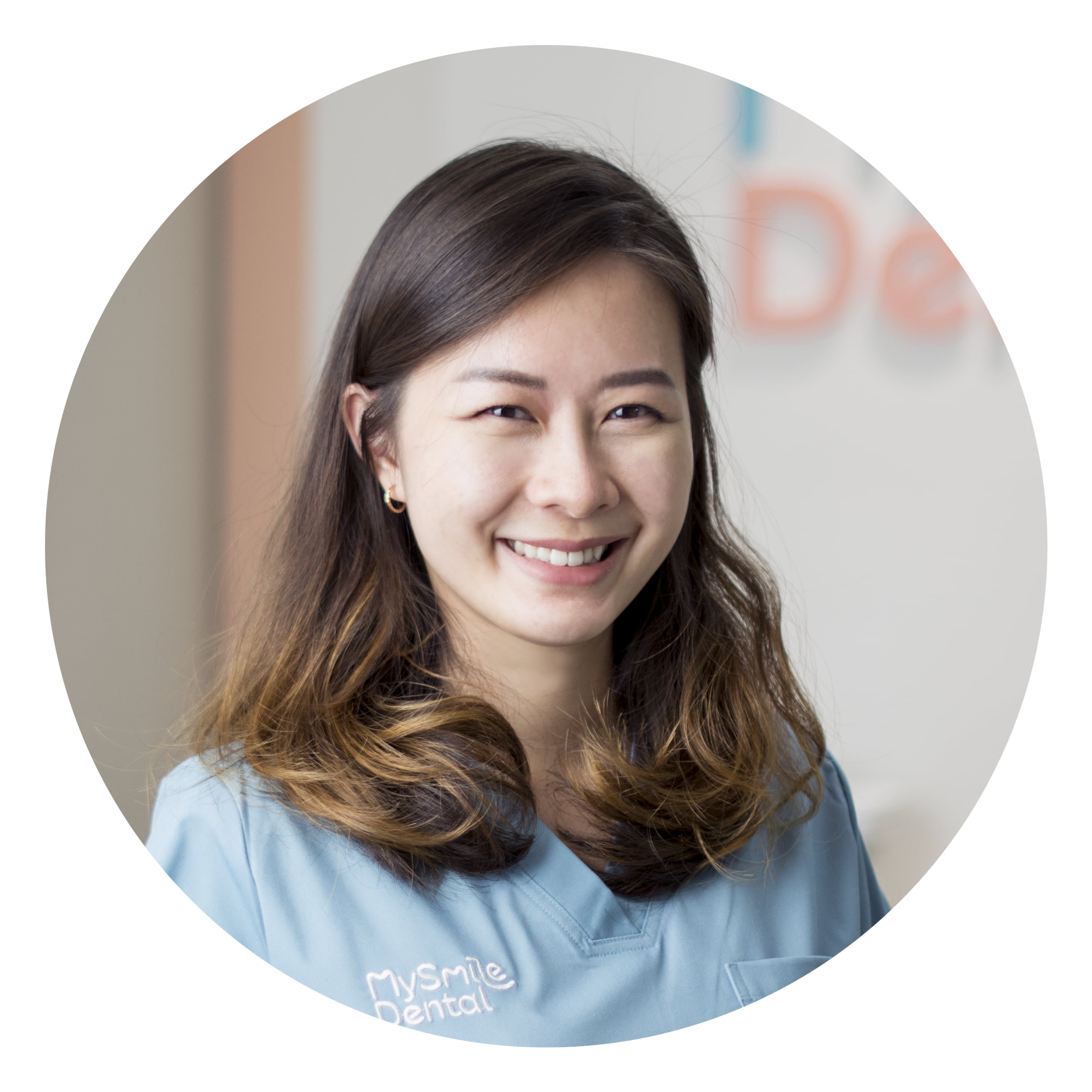 a profile shot of Dr Jody Hong, a dental surgeon at My Smile Dental, smiling